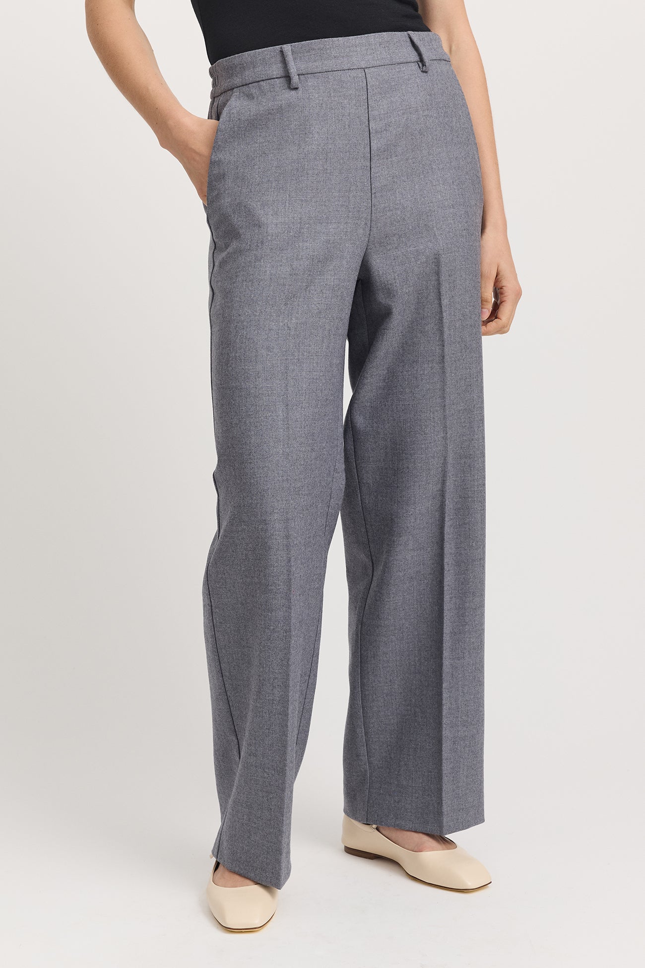 Our model is wearing a size 8. Inleg length for all sizes is approx. 75cm. The leg hemline can easily be altered.