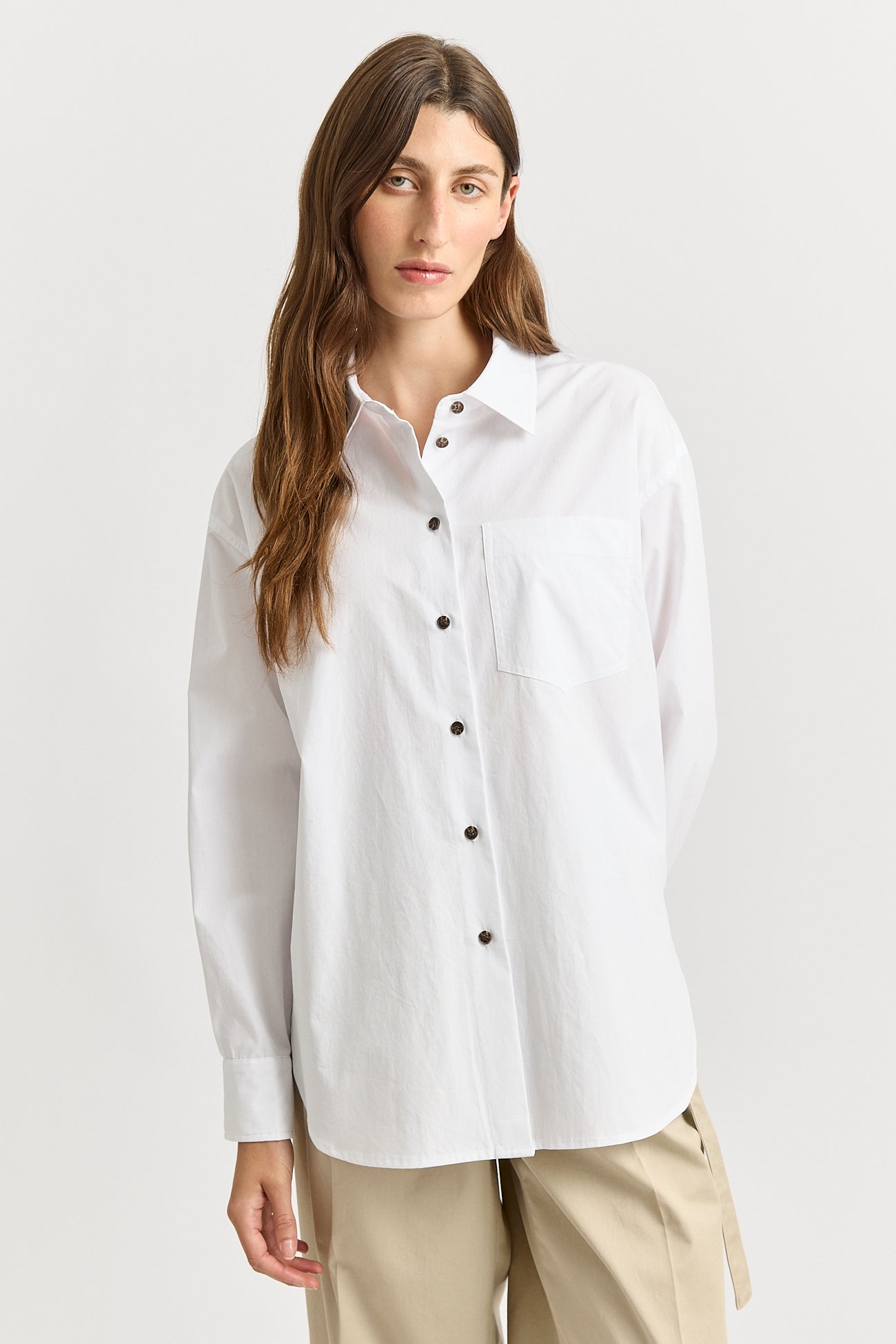 Our model is wearing a size 8. Garment Length for size 8 is 55cm. Add 1cm for each size.