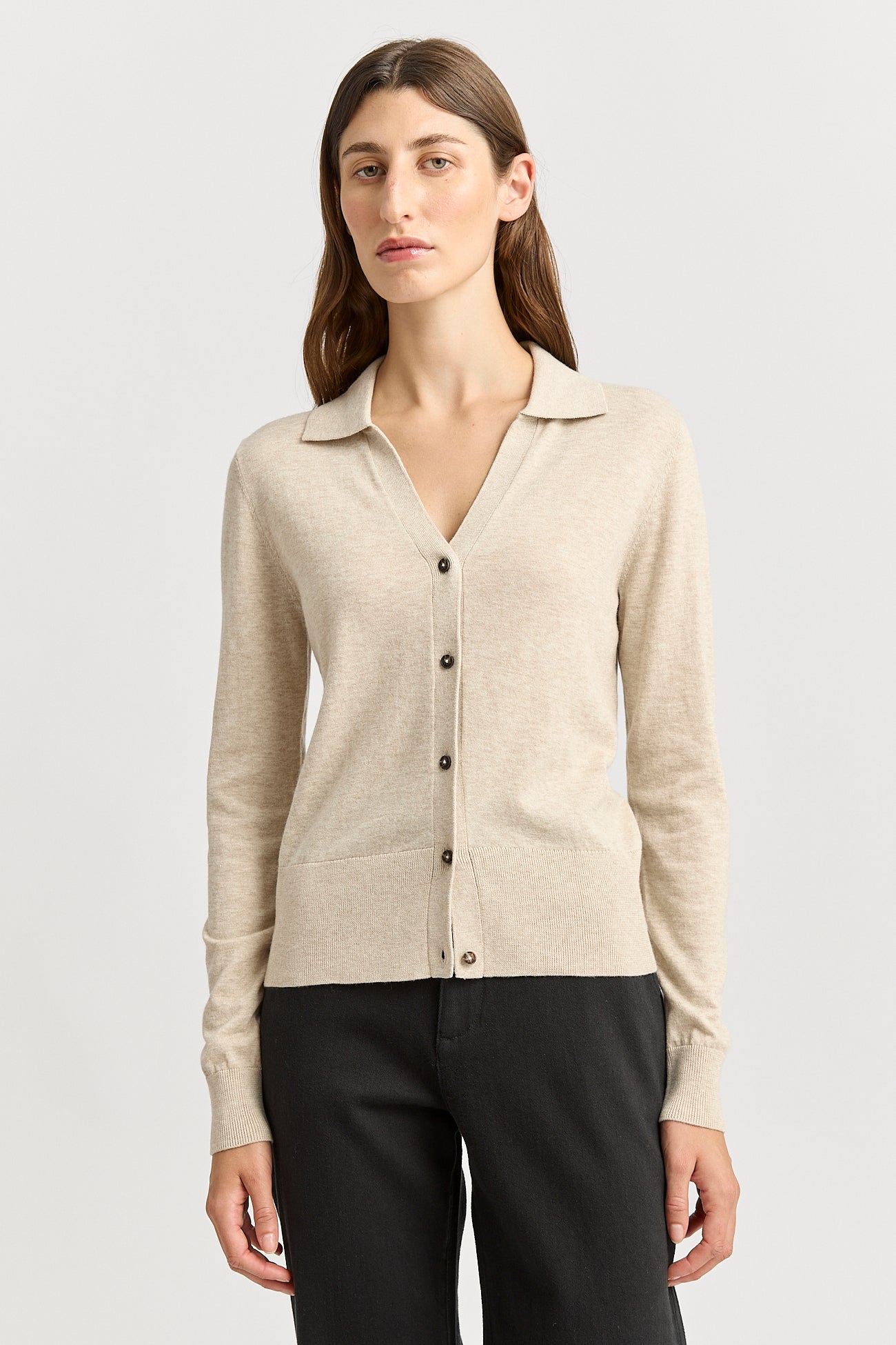 Our model is wearing a size 8. Garment Length for size 8 is 57cm. Add 1cm for each size.