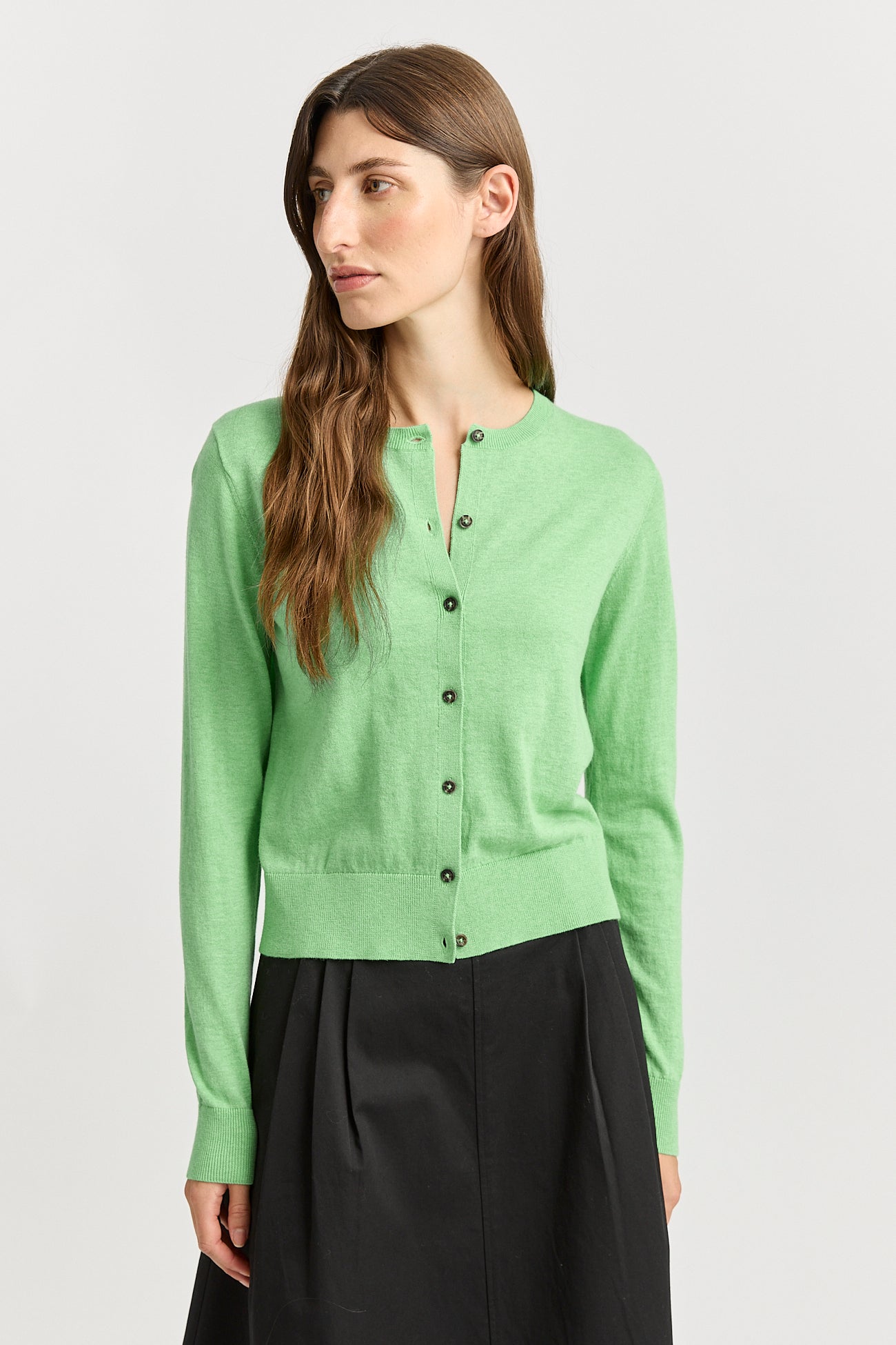 Our model is wearing a size 8. Garment Length for size 8 is 53cm. Add 1cm for each size.