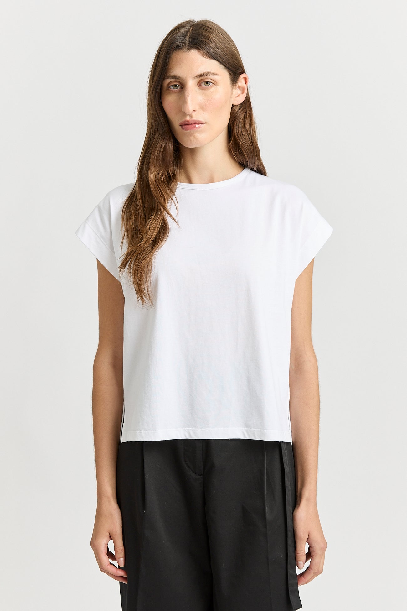 Our model is wearing a size 8. Garment Length for size 8 is 59cm. Add 1cm for each size.