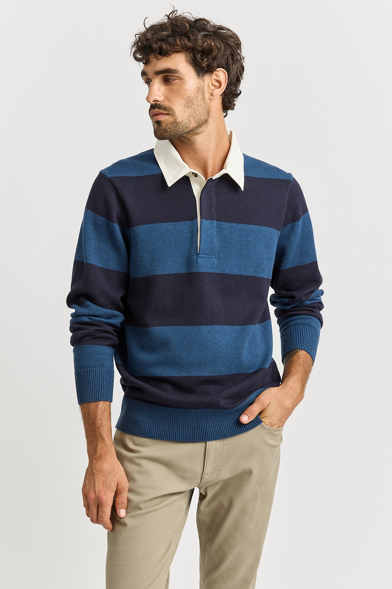 Our model is wearing a size M. Chest Width for size M is 53.5cm. Add 2.5cm for each size. Garment Length for size M is 71cm. Add 1cm for each size.