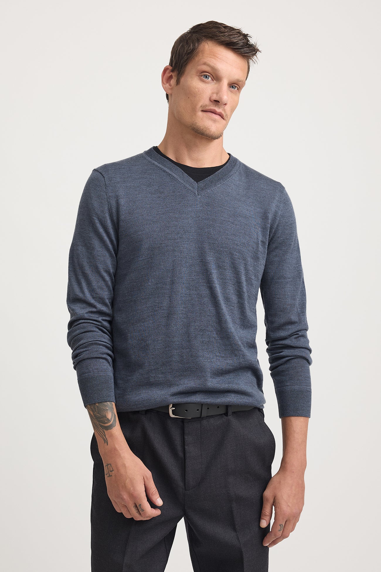 This style has a neat yet classic fit designed to be worn over a tshirt. We recommend taking your usual size or choosing 1 size up if you prefere a more relaxed fit and room for layering over a shirt. Our model is wearing a size M. Chest Width for size M is 52cm. Add 2.5cm for each size. Garment Length for size M is 71cm. Add 1cm for each size.