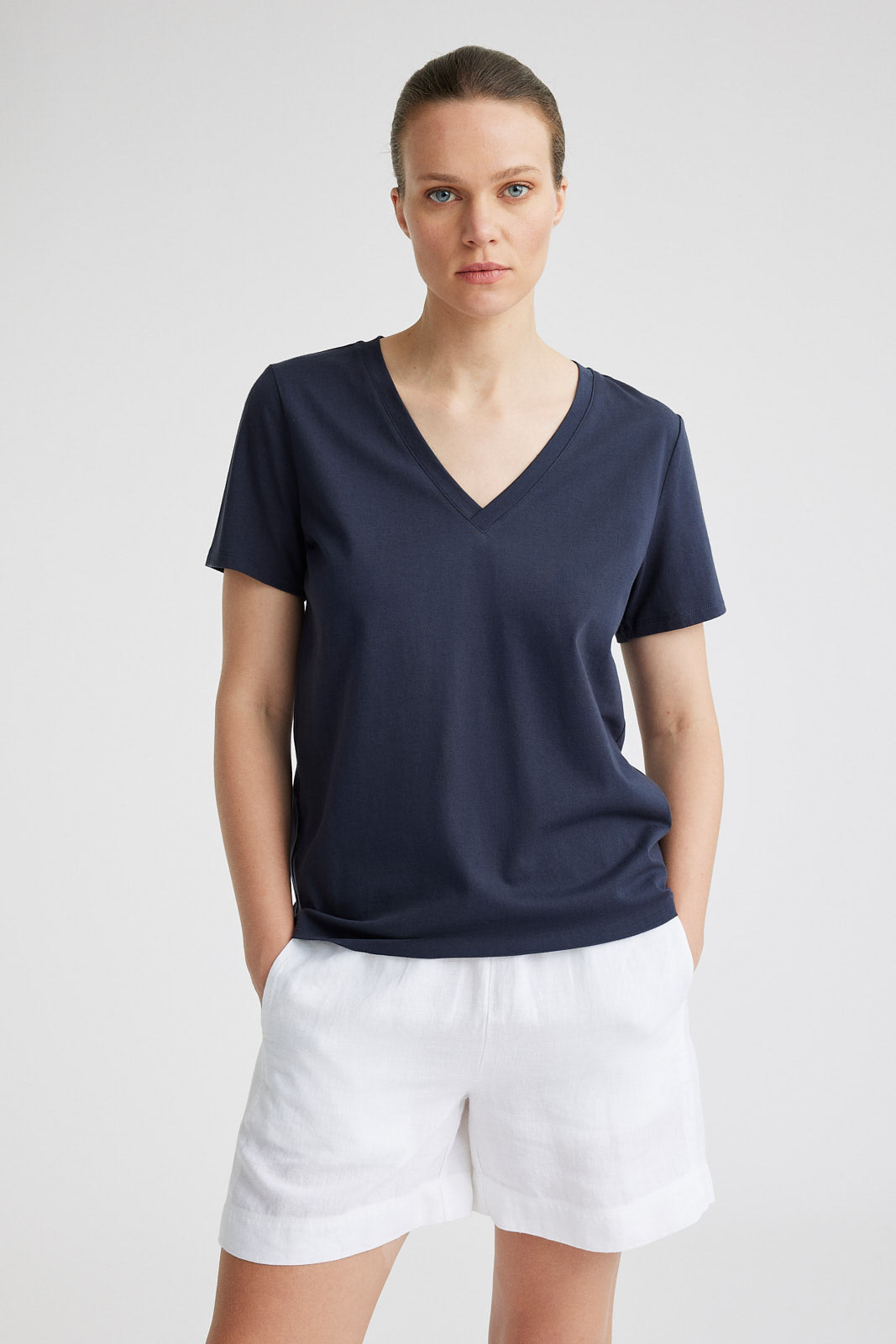 Model is 175cm tall and wears a size 8 AU. Garment Length for Size 8 is 62cm (+/- 1cm for each size).