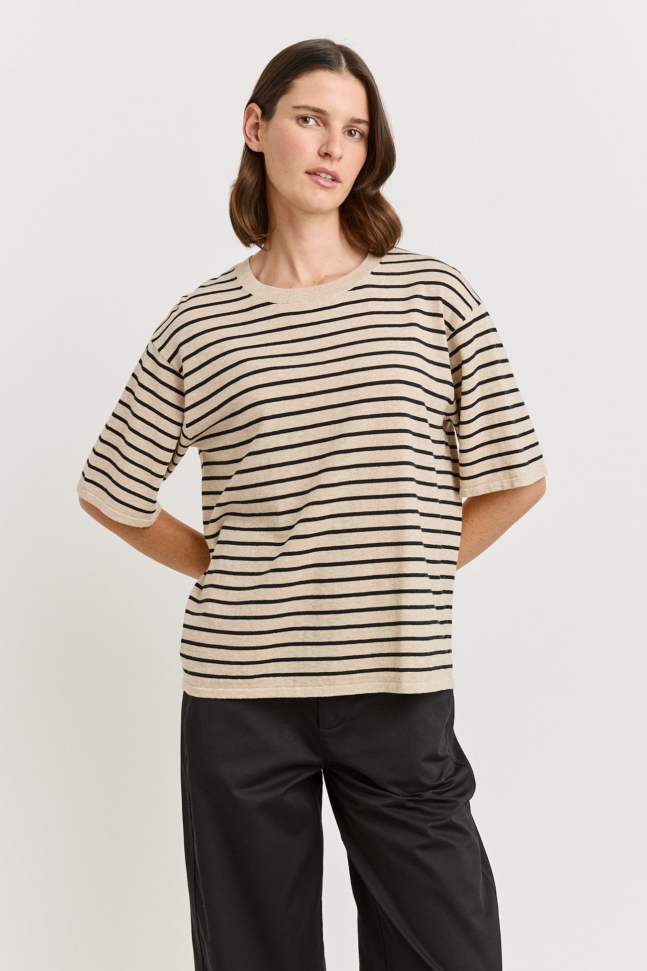 Our model is wearing a size 8. Garment Length for size 8 is 53cm. Add 1cm for each size.
