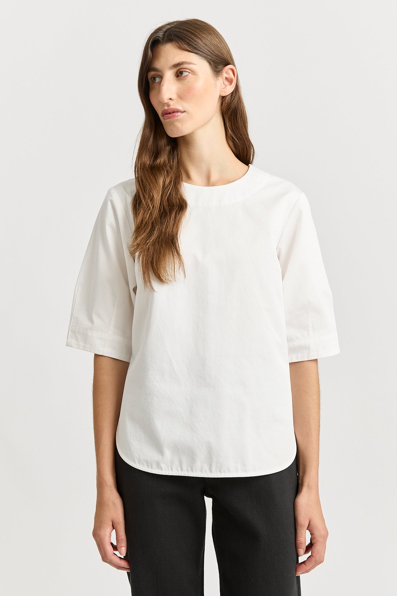 Our model is wearing a size 8. Garment Length for size 8 is 63.5cm. Add 1cm for each size.