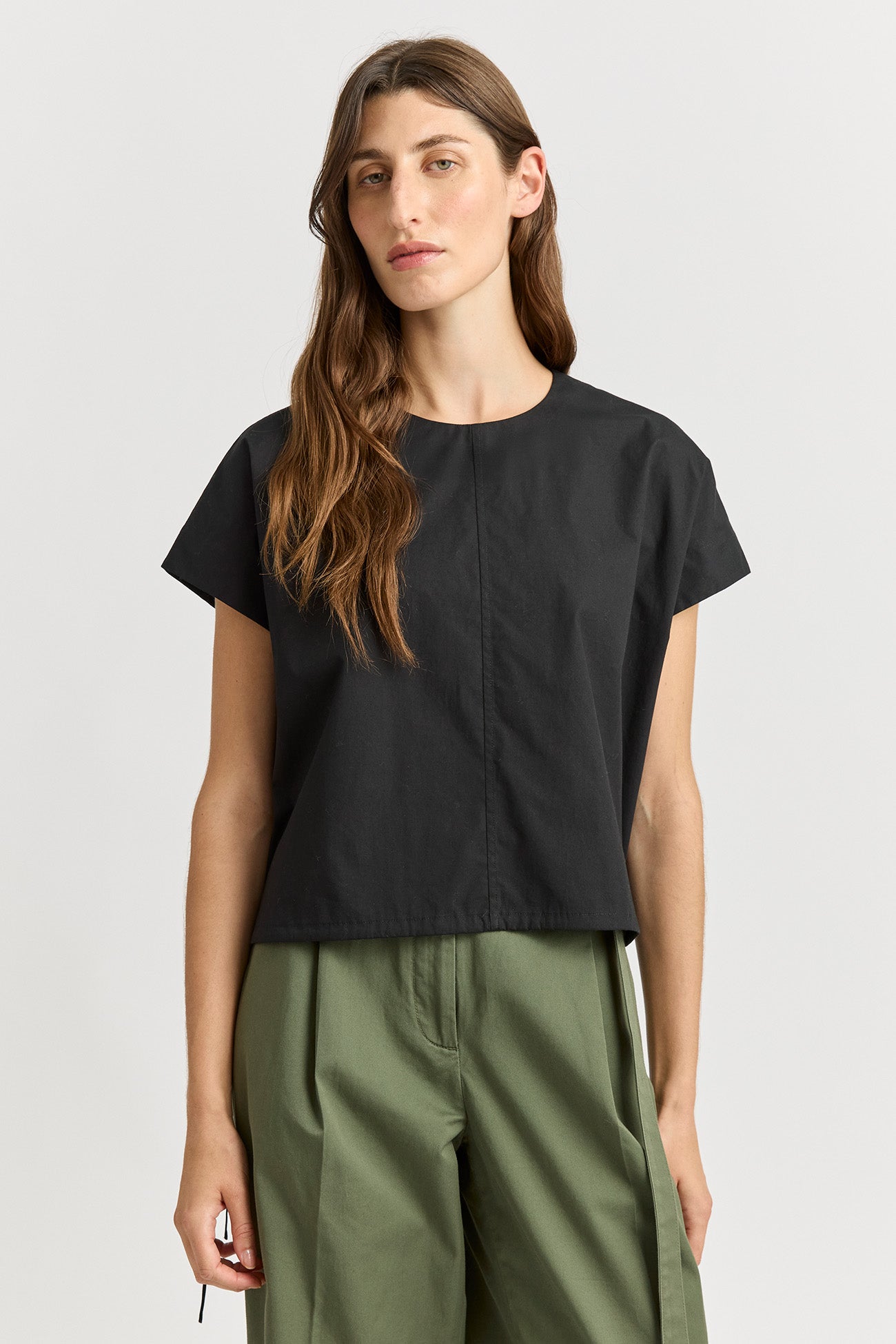 Our model is wearing a size 8. Garment Length for size 8 is 53cm. Add 1cm for each size.