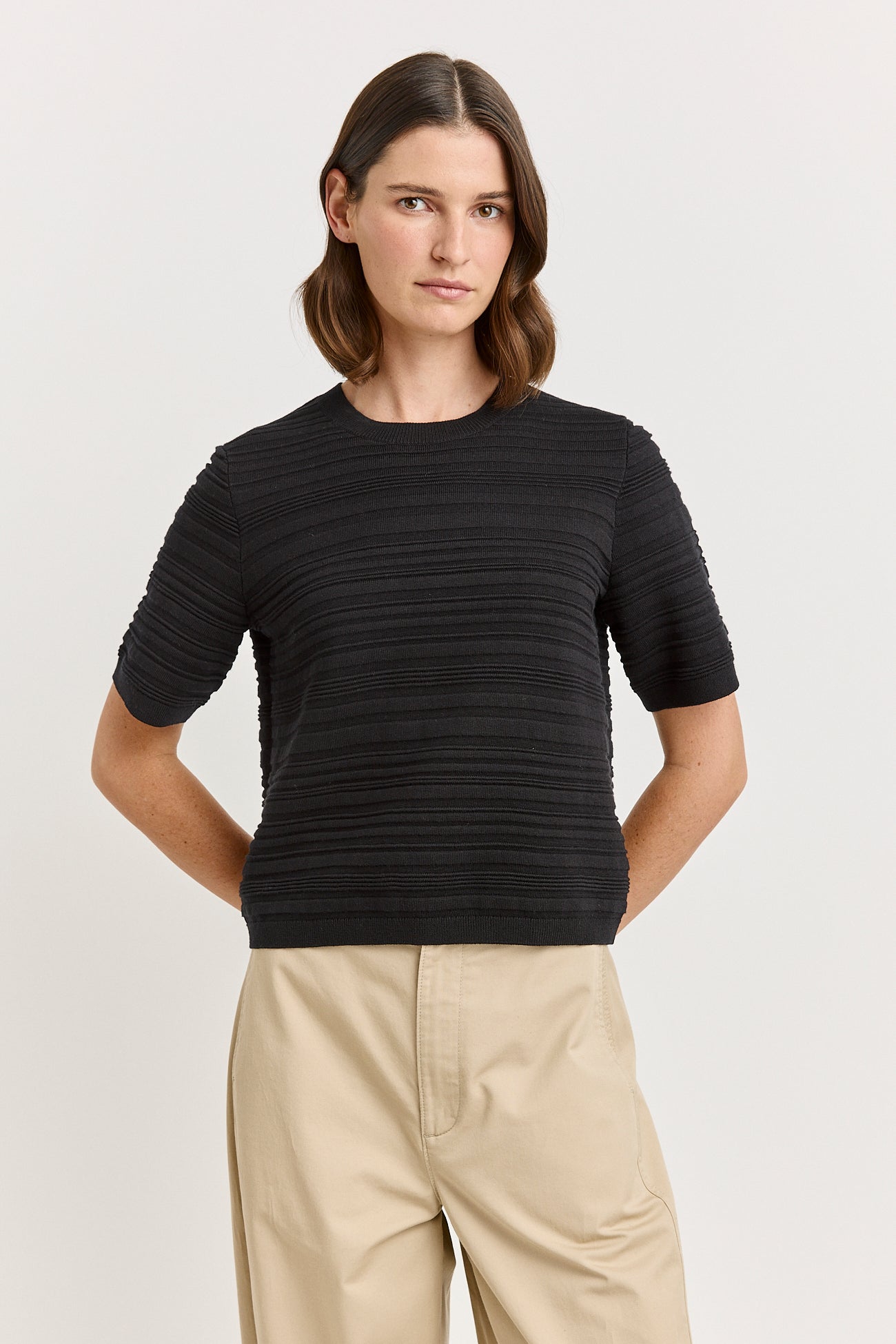 70% ORGANIC Cotton, 30% Australian Merino Wool  Crafted from our lightweight summer yarn, the Parallel Knit Top has a raised horizontal stripe across a neat silhouette, finished with a crew neckline and short sleeves.  Style No: 5205