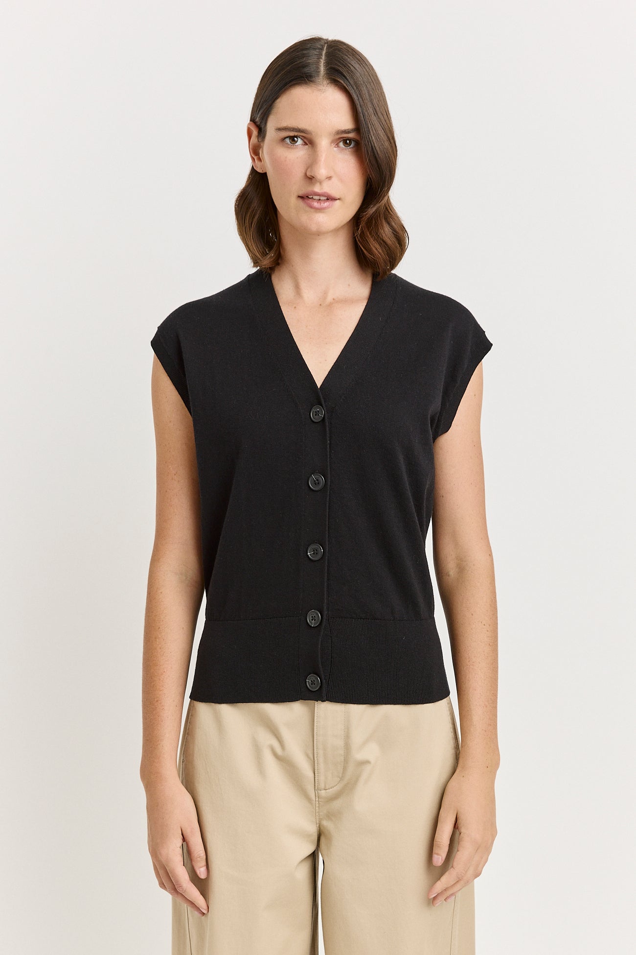 Our model is wearing a size 8. Garment Length for size 8 is 53cm. Add 1cm for each size.