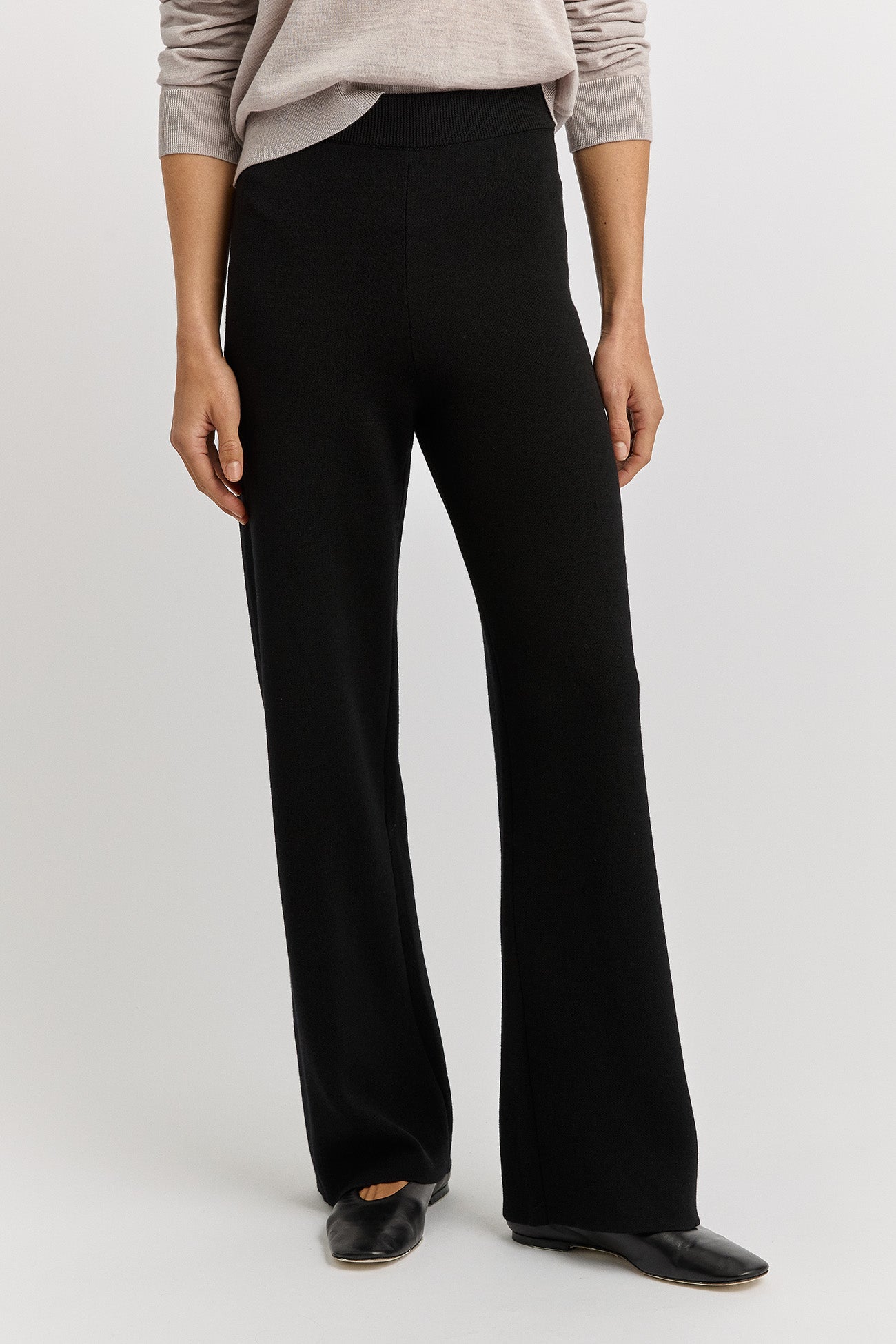 Our model is wearing a size 8. Inleg Length for all sizes is 74.5cm.  The leg hemline cannot be altered. 