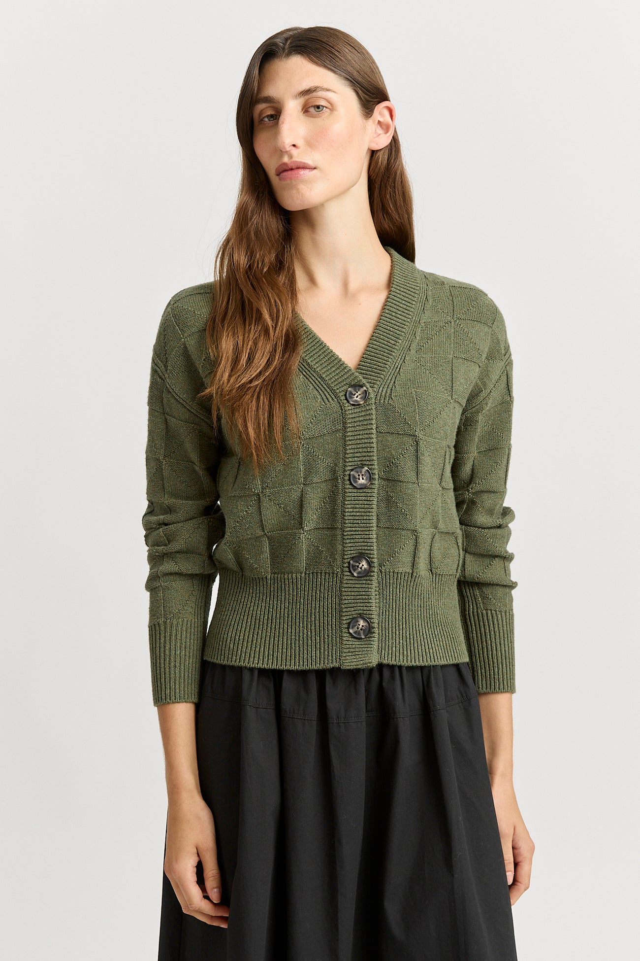 Our model is wearing a size 8. Garment Length for size 8 is 51cm. Add 1cm for each size.