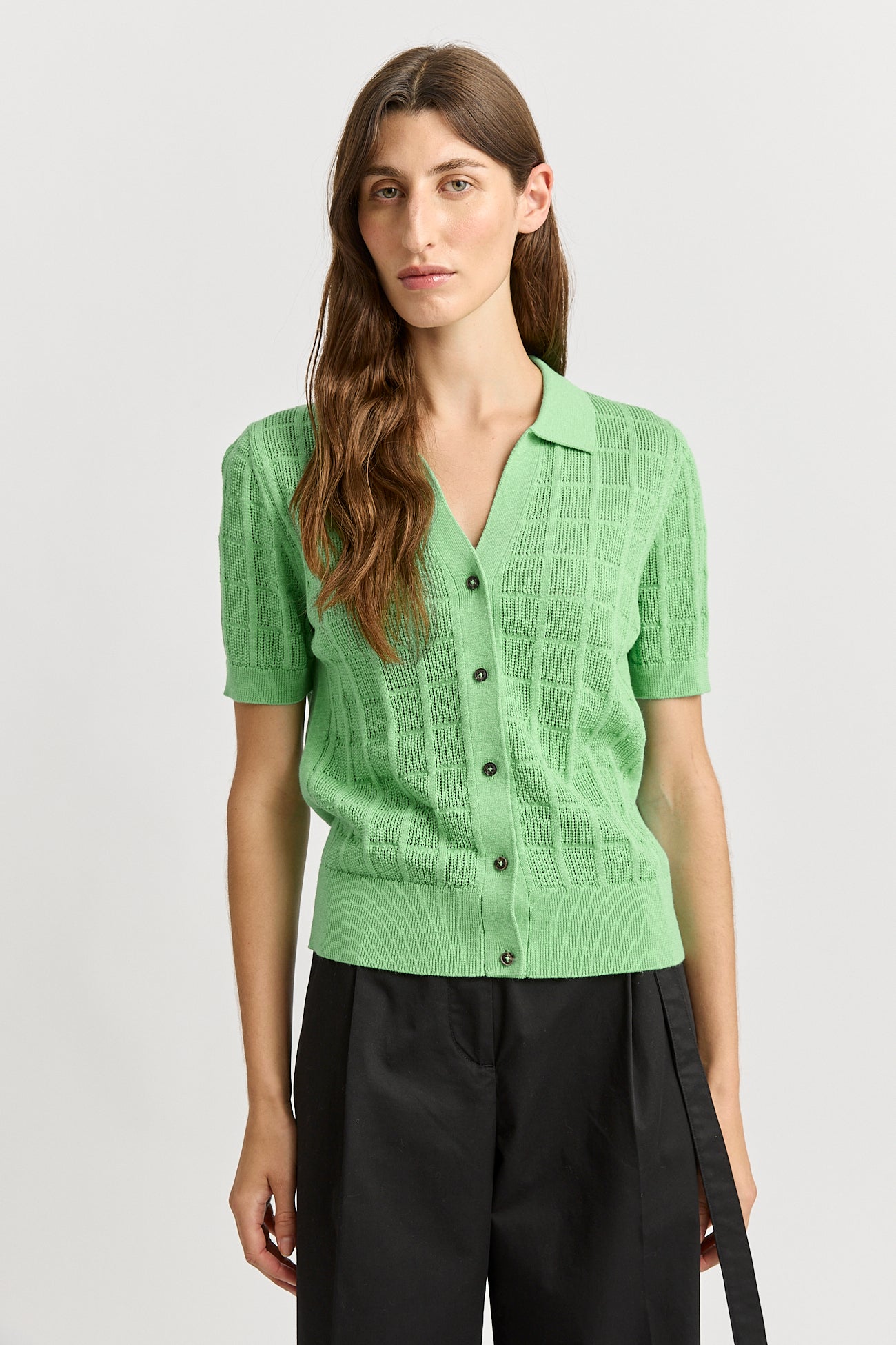 Our model is wearing a size 8. Garment Length for size 8 is 55.5cm. Add 1cm for each size.