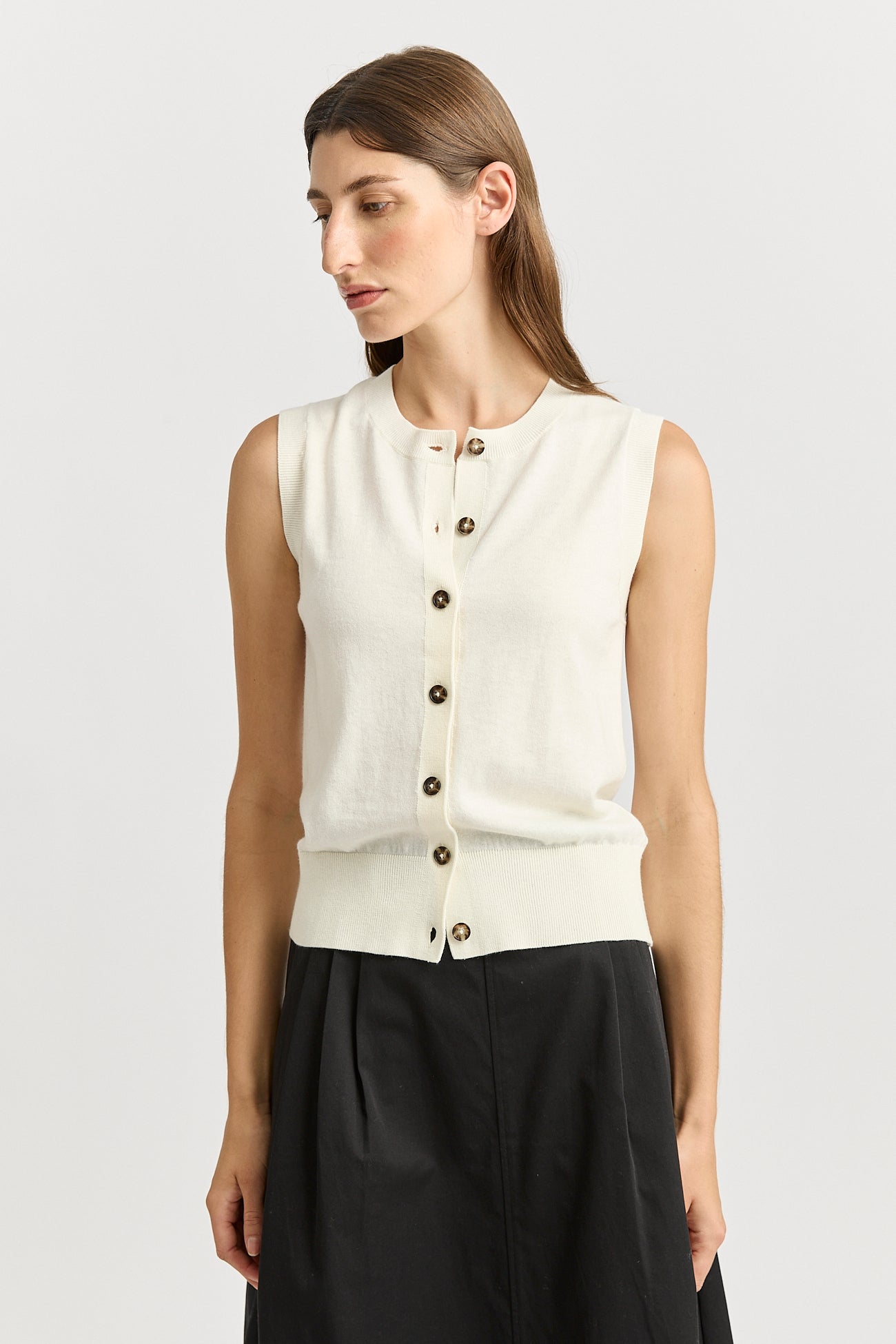Our model is wearing a size 8. Garment Length for size 8 is 55cm. Add 1cm for each size.
