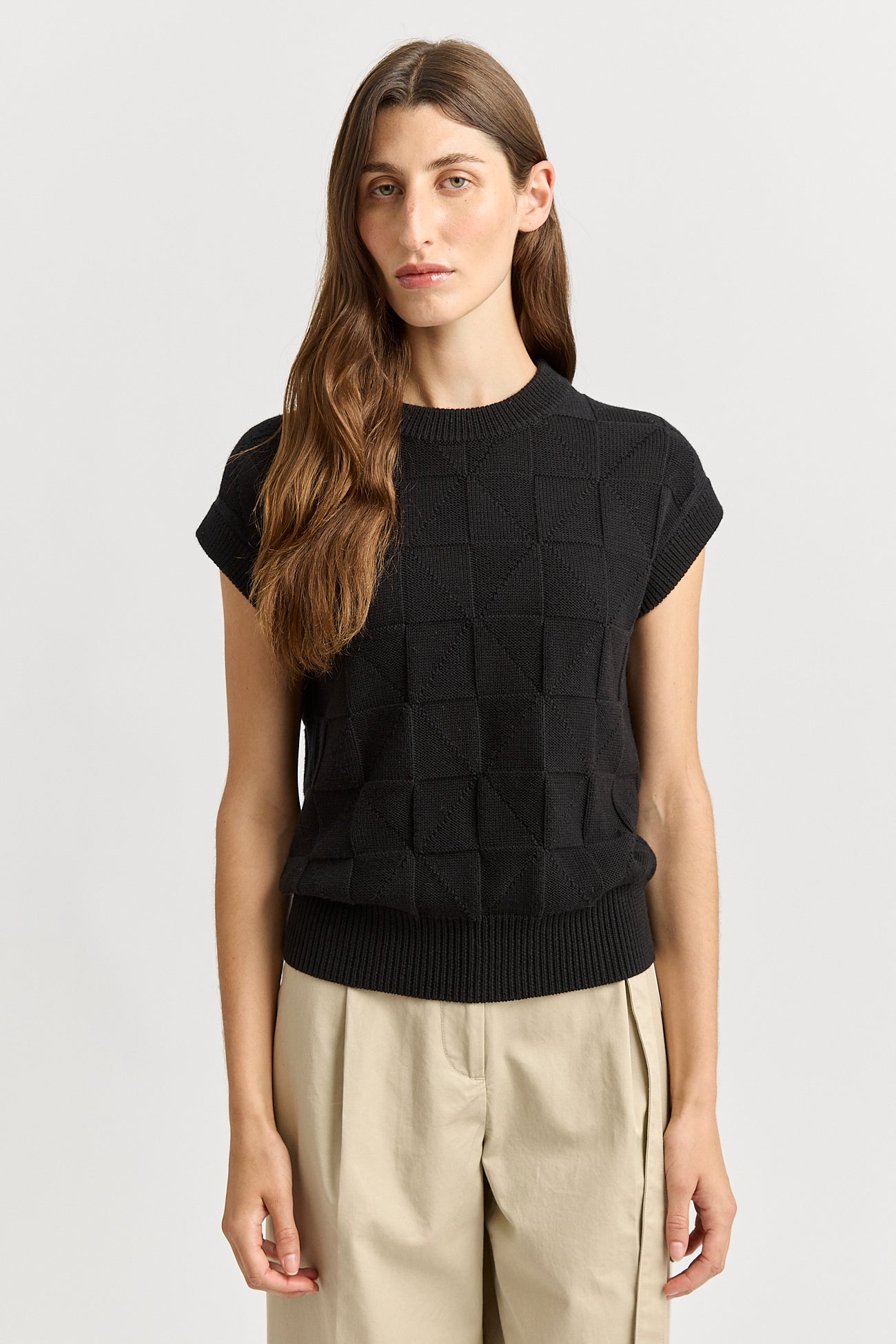 Our model is wearing a size 8. Garment Length for size 8 is 55cm. Add 1cm for each size.