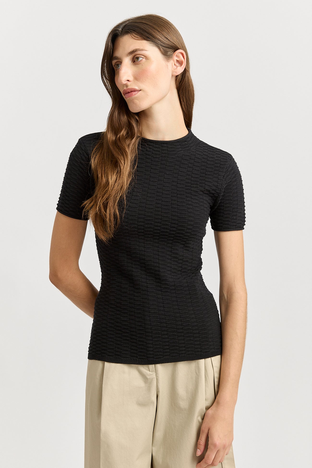 Our model is wearing a size 8. Garment Length for size 8 is 59cm. Add 1cm for each size.