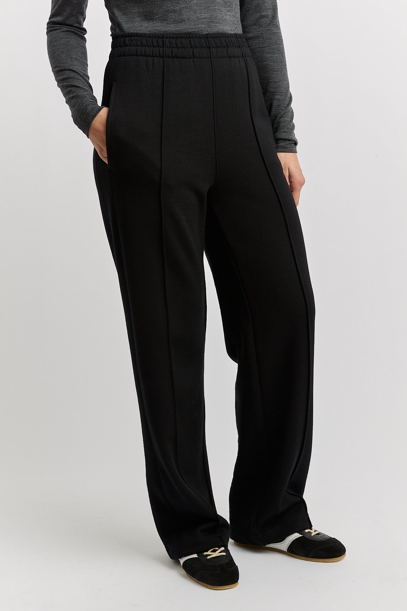 Our model is wearing a size 8. Total Garment Length for size 8 is 106.5cm. Add 0.5cm for each size. Leg length can easily be taken up.