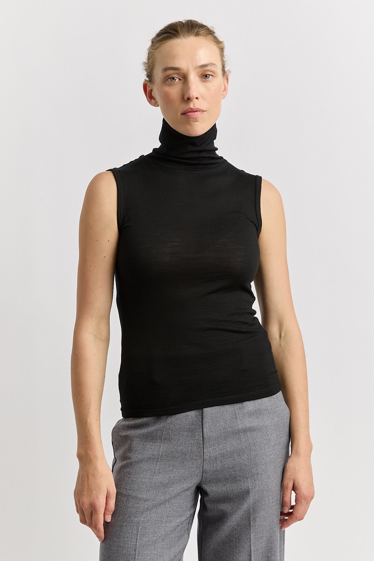 Our model is wearing a size 8. Garment Length for size 8 is 61 cm. Add 1cm for each size.