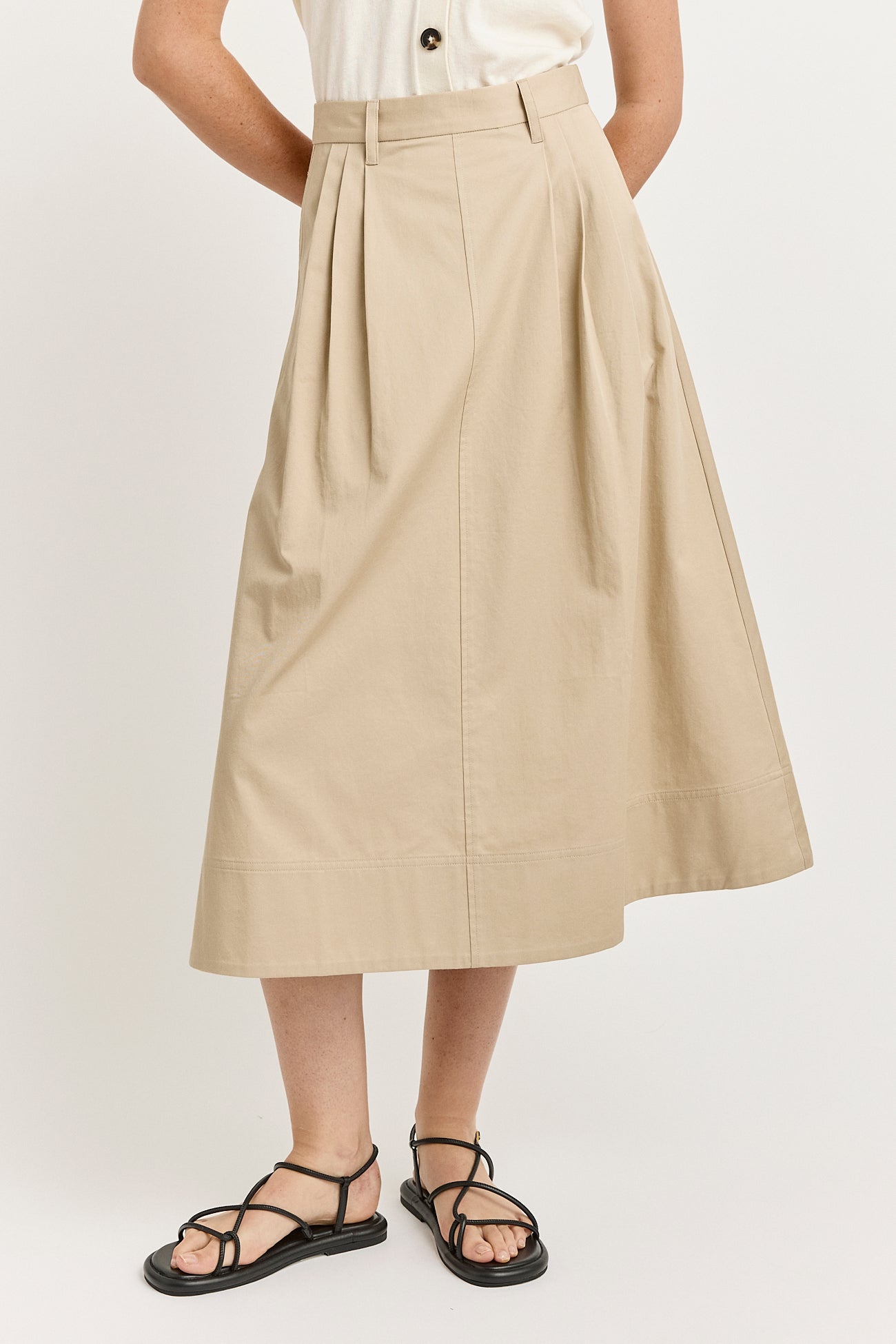 Our model is wearing a size 8. Garment Length for size 8 is 84cm. Add 0.5cm for each size.