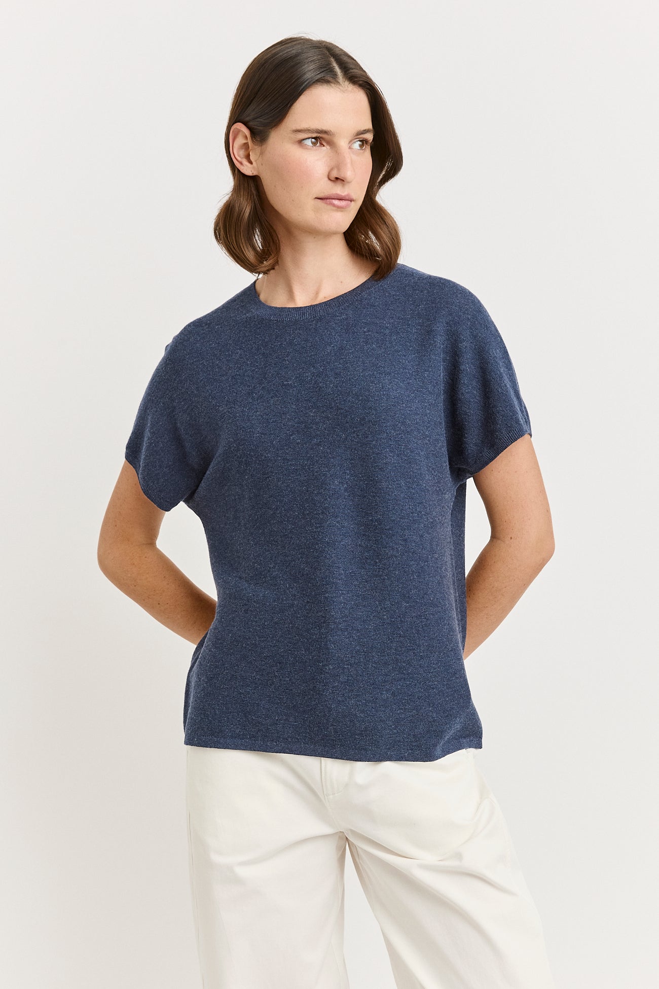 Our model is wearing a size 8. Garment Length for size 8 is 53cm. Add 1cm for each size.